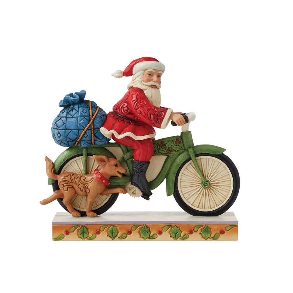 Santa Riding Bicycle Figurine 6010818 by Jim Shore